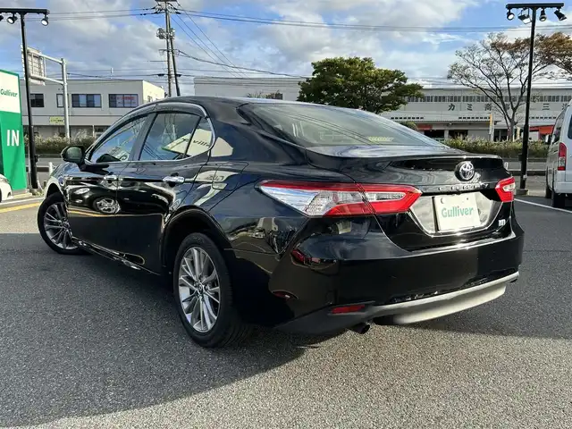 トヨタ カムリ X 鳥取県 2019(令1)年 6.9万km アティチュードブラックマイカ 社外ディスプレイオーディオ／ＢＴ/バックカメラ/ビルトインＥＴＣ/トヨタセーフティセンス/レーダークルーズコントロール/レーンキープアシスト/LEDヘットライト/LEDフォグライト/純正ＯＰ１７インチアルミ/プッシュエンジンスタート/電動パーキングブレーキ/フロアマット/ドアバイザー