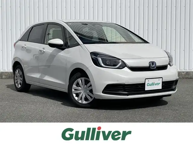 ホンダ フィット e:HEVホーム 福岡県 2023(令5)年 2.1万km プラチナホワイトパール ホンダセンシング/衝突軽減/レーンキープアシスト/コーナーセンサー/社外ナビ（ＭＤＶ－Ｄ２０８ＢＴ）/CD/BT/AM/FM/バックカメラ/ハーフレザー/前席シートヒーター/レーダークルーズコントロール/ＥＴＣ/ＬＥＤオートライト/オートハイビーム/革巻きステアリング/ステアリングリモコン/ＡＡＣ/電動パーキング/ブレーキホールド/スマートキー/プッシュスタート/チップアップシート