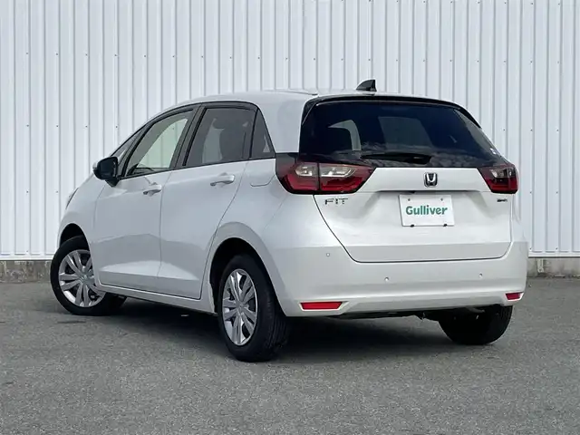 ホンダ フィット e:HEVホーム 福岡県 2023(令5)年 2.1万km プラチナホワイトパール ホンダセンシング/衝突軽減/レーンキープアシスト/コーナーセンサー/社外ナビ（ＭＤＶ－Ｄ２０８ＢＴ）/CD/BT/AM/FM/バックカメラ/ハーフレザー/前席シートヒーター/レーダークルーズコントロール/ＥＴＣ/ＬＥＤオートライト/オートハイビーム/革巻きステアリング/ステアリングリモコン/ＡＡＣ/電動パーキング/ブレーキホールド/スマートキー/プッシュスタート/チップアップシート