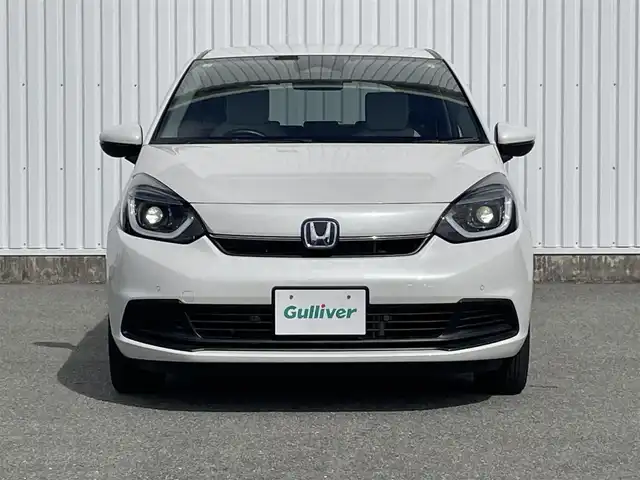 ホンダ フィット e:HEVホーム 福岡県 2023(令5)年 2.1万km プラチナホワイトパール ホンダセンシング/衝突軽減/レーンキープアシスト/コーナーセンサー/社外ナビ（ＭＤＶ－Ｄ２０８ＢＴ）/CD/BT/AM/FM/バックカメラ/ハーフレザー/前席シートヒーター/レーダークルーズコントロール/ＥＴＣ/ＬＥＤオートライト/オートハイビーム/革巻きステアリング/ステアリングリモコン/ＡＡＣ/電動パーキング/ブレーキホールド/スマートキー/プッシュスタート/チップアップシート