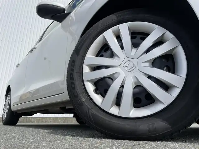ホンダ フィット e:HEVホーム 福岡県 2023(令5)年 2.1万km プラチナホワイトパール ホンダセンシング/衝突軽減/レーンキープアシスト/コーナーセンサー/社外ナビ（ＭＤＶ－Ｄ２０８ＢＴ）/CD/BT/AM/FM/バックカメラ/ハーフレザー/前席シートヒーター/レーダークルーズコントロール/ＥＴＣ/ＬＥＤオートライト/オートハイビーム/革巻きステアリング/ステアリングリモコン/ＡＡＣ/電動パーキング/ブレーキホールド/スマートキー/プッシュスタート/チップアップシート