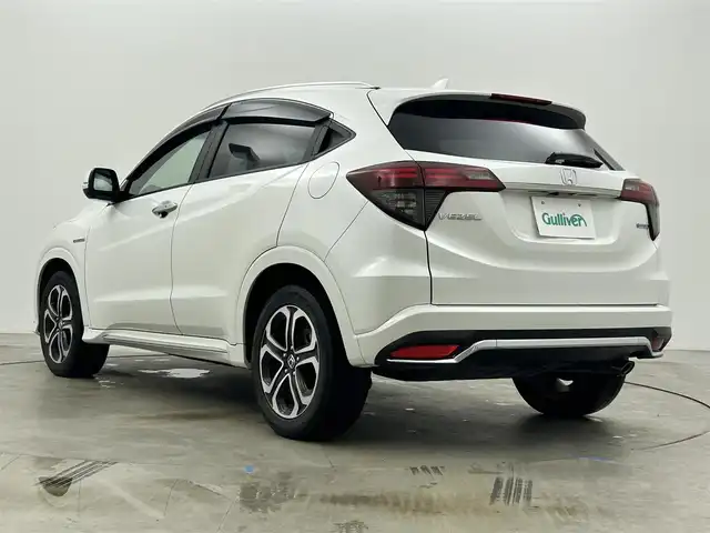 ホンダ ヴェゼル ハイブリッド Z ホンダセンシング 岡山県 2021(令3)年 4.5万km プラチナホワイトパール 純正８インチナビ/【Bluetooth/フルセグTV/Carplay/USB接続/CD/DVD/HDMI接続/USB接続】/型番:VXM-217VFEi/バックカメラ/前席シートヒーター/純正ドライブレコーダー（前後）/レーダークルーズコントロール/衝突軽減ブレーキ/ＬＥＤヘッドライト/フォグランプ/オートライト/ビルトインＥＴＣ/パドルシフト/アイドリングストップ/オートブレーキホールド/ルーフレール/スマートキー×1/新車保証書/取扱説明書/スペアキー×１