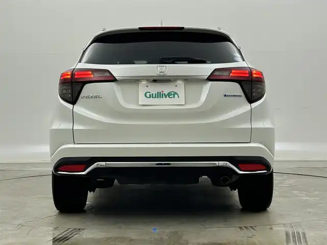 ホンダ ヴェゼル ハイブリッド Z ホンダセンシング 岡山県 2021(令3)年 4.5万km プラチナホワイトパール 純正８インチナビ/【Bluetooth/フルセグTV/Carplay/USB接続/CD/DVD/HDMI接続/USB接続】/型番:VXM-217VFEi/バックカメラ/前席シートヒーター/純正ドライブレコーダー（前後）/レーダークルーズコントロール/衝突軽減ブレーキ/ＬＥＤヘッドライト/フォグランプ/オートライト/ビルトインＥＴＣ/パドルシフト/アイドリングストップ/オートブレーキホールド/ルーフレール/スマートキー×1/新車保証書/取扱説明書/スペアキー×１