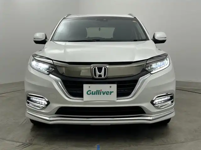 ホンダ ヴェゼル ハイブリッド Z ホンダセンシング 岡山県 2021(令3)年 4.5万km プラチナホワイトパール 純正８インチナビ/【Bluetooth/フルセグTV/Carplay/USB接続/CD/DVD/HDMI接続/USB接続】/型番:VXM-217VFEi/バックカメラ/前席シートヒーター/純正ドライブレコーダー（前後）/レーダークルーズコントロール/衝突軽減ブレーキ/ＬＥＤヘッドライト/フォグランプ/オートライト/ビルトインＥＴＣ/パドルシフト/アイドリングストップ/オートブレーキホールド/ルーフレール/スマートキー×1/新車保証書/取扱説明書/スペアキー×１