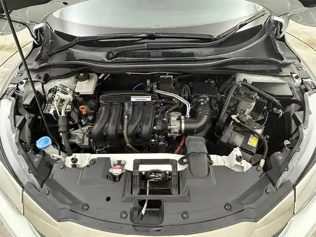 ホンダ ヴェゼル ハイブリッド Z ホンダセンシング 岡山県 2021(令3)年 4.5万km プラチナホワイトパール 純正８インチナビ/【Bluetooth/フルセグTV/Carplay/USB接続/CD/DVD/HDMI接続/USB接続】/型番:VXM-217VFEi/バックカメラ/前席シートヒーター/純正ドライブレコーダー（前後）/レーダークルーズコントロール/衝突軽減ブレーキ/ＬＥＤヘッドライト/フォグランプ/オートライト/ビルトインＥＴＣ/パドルシフト/アイドリングストップ/オートブレーキホールド/ルーフレール/スマートキー×1/新車保証書/取扱説明書/スペアキー×１