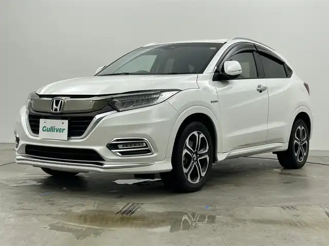 ホンダ ヴェゼル ハイブリッド Z ホンダセンシング 岡山県 2021(令3)年 4.5万km プラチナホワイトパール 純正８インチナビ/【Bluetooth/フルセグTV/Carplay/USB接続/CD/DVD/HDMI接続/USB接続】/型番:VXM-217VFEi/バックカメラ/前席シートヒーター/純正ドライブレコーダー（前後）/レーダークルーズコントロール/衝突軽減ブレーキ/ＬＥＤヘッドライト/フォグランプ/オートライト/ビルトインＥＴＣ/パドルシフト/アイドリングストップ/オートブレーキホールド/ルーフレール/スマートキー×1/新車保証書/取扱説明書/スペアキー×１