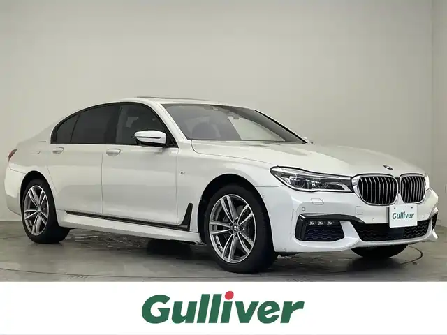 ＢＭＷ ７４０ｉ Mスポーツ 滋賀県 2016(平28)年 11.6万km パール 純正ナビ/（CD/DVD/Bluetooth/フルセグTV）/全方位カメラ/サンルーフ/harman/kardon/前方ドライブレコーダー/レザーシート/シートメモリー/パワーシート/ベンチレーション/シートヒーター/電動パーキングブレーキ/オートホールドブレーキ/LEDヘッドライト/フォグランプ/オートヘッドライト/革巻きステアリング/クルーズコントロール/パドルシフト/ステアリングリモコン/USB充電/スペアキー