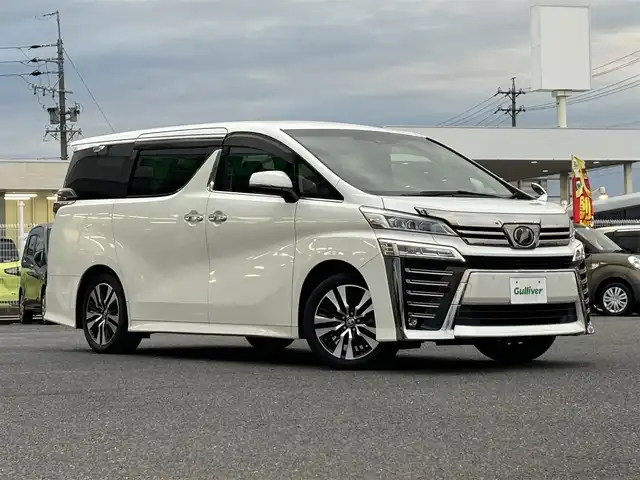 トヨタ ヴェルファイア Z Gエディション 愛知県 2019(令1)年 4.1万km ホワイトパールクリスタルシャイン /禁煙車//ワンオーナー//純正フリップダウンモニター//純正メモリーナビ(NSZN-Z68T)//フルセグTV/CD/DVD//バックカメラ//ETC//黒革シート//シートヒーター//エアシート//パワーシート(メモリ機能付き)//純正LEDオートヘッドライト//オートハイビーム//純正LEDフォグランプ//コンビステアリング//ステアリングスイッチ//ステアリングヒーター//パワーバックドア//全天周ドライブレコーダー//オートリトラウィンカーミラー//シーケンシャルウィンカー//PCS/LTA/PKSB/RSA/ACC/横滑り防止//リアロールシェード//オットマン付シート//自動防眩ルームミラー//照明付バニティミラー//スマートキー//スペアスマートキー//純正フロアマット//純正ドアバイザー//スペアタイヤ//AW付スタッドレスタイヤ4本(車載有)//新車時保証書//取扱説明書