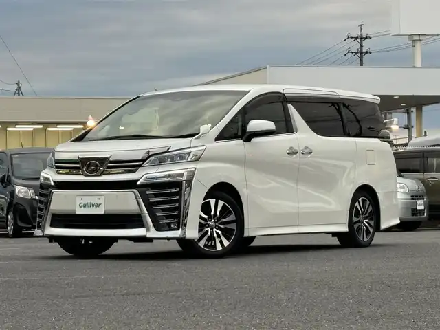 トヨタ ヴェルファイア Z Gエディション 愛知県 2019(令1)年 4.1万km ホワイトパールクリスタルシャイン /禁煙車//ワンオーナー//純正フリップダウンモニター//純正メモリーナビ(NSZN-Z68T)//フルセグTV/CD/DVD//バックカメラ//ETC//黒革シート//シートヒーター//エアシート//パワーシート(メモリ機能付き)//純正LEDオートヘッドライト//オートハイビーム//純正LEDフォグランプ//コンビステアリング//ステアリングスイッチ//ステアリングヒーター//パワーバックドア//全天周ドライブレコーダー//オートリトラウィンカーミラー//シーケンシャルウィンカー//PCS/LTA/PKSB/RSA/ACC/横滑り防止//リアロールシェード//オットマン付シート//自動防眩ルームミラー//照明付バニティミラー//スマートキー//スペアスマートキー//純正フロアマット//純正ドアバイザー//スペアタイヤ//AW付スタッドレスタイヤ4本(車載有)//新車時保証書//取扱説明書