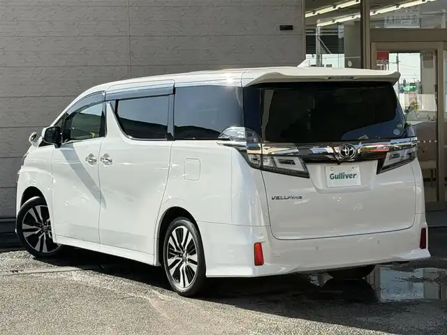 トヨタ ヴェルファイア Z Gエディション 兵庫県 2019(令1)年 4.1万km ホワイトパールクリスタルシャイン 純正メモリーナビ(NSZN-Z68T)/（フルセグTV/CD/DVD）/純正フリップダウンモニター/バックカメラ/ETC/黒革シート/シートヒーター/エアシート/パワーシート(メモリ機能付き)/純正LEDオートヘッドライト/オートハイビーム/純正LEDフォグランプ/コンビステアリング/ステアリングスイッチ/ステアリングヒーター/パワーバックドア/全方位ドライブレコーダー/オートリトラウィンカーミラー//シーケンシャルウィンカー/PCS/LTA/PKSB/RSA/ACC/横滑り防止/リアロールシェード/オットマン付シート/自動防眩ルームミラー/照明付バニティミラー/スマートキー/スペアスマートキー/純正フロアマット/純正ドアバイザー/スペアタイヤ/AW付スタッドレスタイヤ4本(車載有)/新車時保証書/取扱説明書