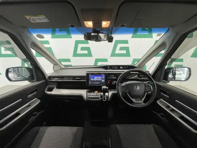 ホンダ ステップワゴン スパーダ ホンダセンシング 鹿児島県 2016(平28)年 5.2万km プレミアムスパークルブラックパール 禁煙車　/純正ナビ(CD/DVD/フルセグTV/Bluetooth)　/バックカメラ　/両側パワースライドドア　/ホンダセンシング　/・衝突軽減ブレーキ/・アダプティブクルーズコントロール/・車線維持支援システム/・路外逸脱抑制機能/・誤発進抑制機能/・先行車発進お知らせ機能/・標識認識機能/フリップダウンモニター　/追従型クルーズコントロール　/コーナーセンサー　/わくわくゲート/LEDヘッドライト　/ETC　/純正フロアマット　/純正アルミホイール/ドアバイザー