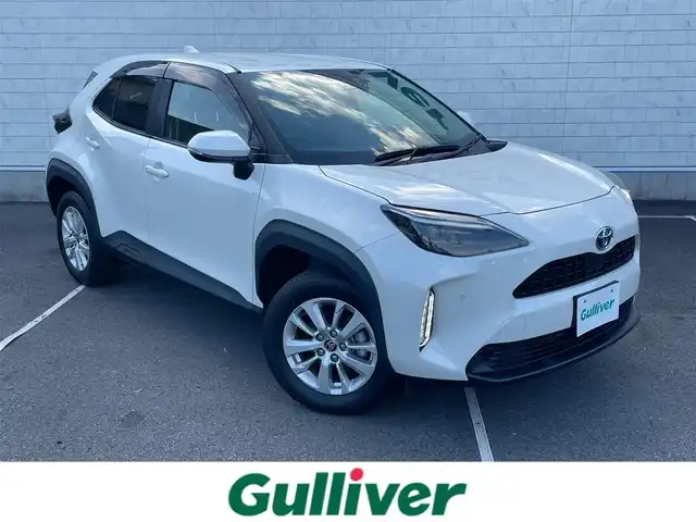 トヨタ ヤリスクロス ハイブリッド G 静岡県 2021(令3)年 2.6万km ホワイトパールクリスタルシャイン ワンオーナー/純正ディスプレイオーディオナビ/（AM/FM/BT/Miracast)/フルセグTV/HDMI端子有り/バックカメラ/クリアランスソナー/レーダークルーズコントロール/トヨタセーフティセンス/プリクラッシュセーフティ/レーンキープアシスト/横滑り防止装置/電動パーキングブレーキ/オートホールド/スマートキー/プッシュスタート/ビルトインETC2.0/LEDヘッドライト/オートマチックハイビーム/純正16インチアルミホイール/純正フロアマット/社外前後型ドライブレコーダー/（TZ-D205W）/取扱説明書/保証書