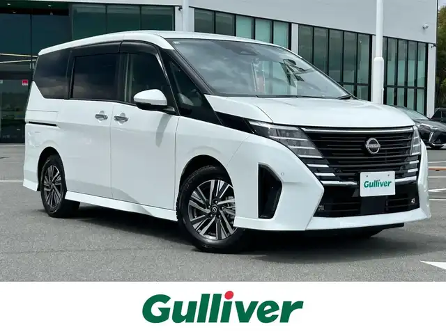 日産 セレナ ハイウェイスター V 奈良県 2022(令4)年 1.8万km プリズムホワイト 純正１２．３インチナビ　/フルセグＴＶ　/BT/HDMI/USB/アラウンドビューモニター　/前後ドライブレコーダー　/デジタルインナーミラー　/プロパイロット　/置くだけ充電　/ＥＴＣ２．０　/前後コーナーセンサー　/シートヒーター　/ＷＡＣ/AUTOHOLD/LEDヘッドライト/オートライト/両側パワースライドドア/追従型クルーズコントロール/パドルシフト