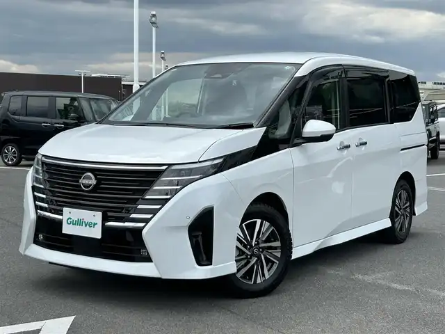 日産 セレナ ハイウェイスター V 奈良県 2022(令4)年 1.8万km プリズムホワイト 純正１２．３インチナビ　/フルセグＴＶ　/BT/HDMI/USB/アラウンドビューモニター　/前後ドライブレコーダー　/デジタルインナーミラー　/プロパイロット　/置くだけ充電　/ＥＴＣ２．０　/前後コーナーセンサー　/シートヒーター　/ＷＡＣ/AUTOHOLD/LEDヘッドライト/オートライト/両側パワースライドドア/追従型クルーズコントロール/パドルシフト
