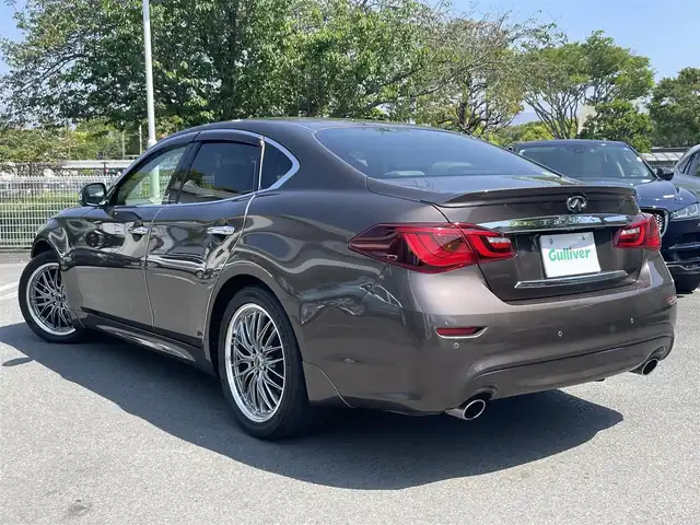 日産 フーガ ハイブリッド 静岡県 2016(平28)年 6.4万km 茶 衝突軽減Ｂ　/ＤＣＡ　/ＬＤＡ　/ＢＳＩ　/ＬＤＷ　/サンルーフ　　/ベージュ革シート　/前席ＰＷシート&シートヒーター&エアシート　/純正ナビ　/全方位カメラ　/地デジ　/ＢＯＳＥサウンド/Waruic 19インチAW/社外３６０度ドラレコ/スマートキー /スペアキー /保証証/取説