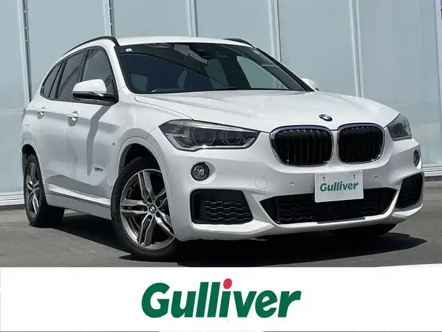 ＢＭＷ Ｘ１ sDrive 18i Mスポーツ 神奈川県 2016(平28)年 5.1万km アルピンホワイトⅢ ・前後ドライブレコーダー　/・ＭＴモード付きＡＴ　/・Ｗエアコン　/・衝突軽減システム　/・前後コーナーセンサー　/・純正１８インチアルミホイール　/・Bluetooth完備　/・ＢＭＷＭシリーズ　/・ＳＵＶ　/・車外バックカメラ