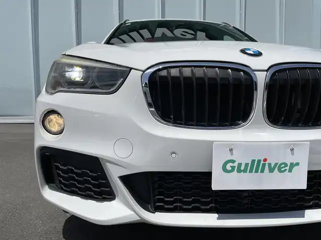 ＢＭＷ Ｘ１ sDrive 18i Mスポーツ 神奈川県 2016(平28)年 5.1万km アルピンホワイトⅢ ・前後ドライブレコーダー　/・ＭＴモード付きＡＴ　/・Ｗエアコン　/・衝突軽減システム　/・前後コーナーセンサー　/・純正１８インチアルミホイール　/・Bluetooth完備　/・ＢＭＷＭシリーズ　/・ＳＵＶ　/・車外バックカメラ