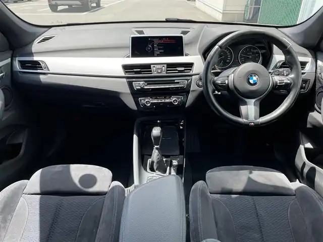 ＢＭＷ Ｘ１ sDrive 18i Mスポーツ 神奈川県 2016(平28)年 5.1万km アルピンホワイトⅢ ・前後ドライブレコーダー　/・ＭＴモード付きＡＴ　/・Ｗエアコン　/・衝突軽減システム　/・前後コーナーセンサー　/・純正１８インチアルミホイール　/・Bluetooth完備　/・ＢＭＷＭシリーズ　/・ＳＵＶ　/・車外バックカメラ