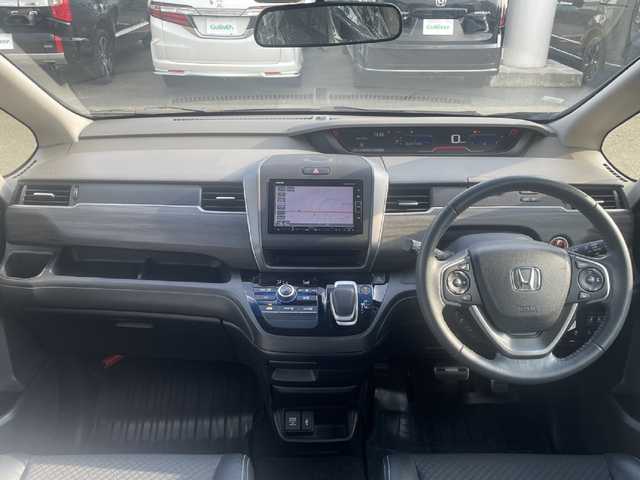 ホンダ フリード ハイブリット G ホンダセンシング 和歌山県 2020(令2)年 2.5万km クリスタルブラックパール 純正ナビ/バックカメラ/フルセグTV/（BT/USB/CD/DVD)/衝突軽減ブレーキ/アダプティブクルーズコントロール/レーンキープ/コーナーセンサー/横滑り防止機能/両側パワースライドドア/純正ゴムマット/純正アルミホイール/アイドリングストップ/LEDヘッドライト/オートライト