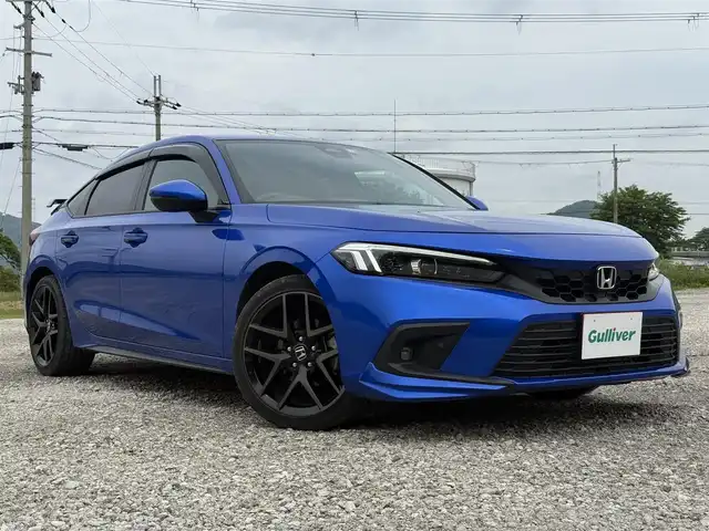ホンダ シビック EX 兵庫県 2022(令4)年 2.6万km プレミアムクリスタルブルークリスタル 純正OPテールゲートスポイラー/純正ナビ/フルセグTV/前2席パワーシート/BOSEサウンド/ワイヤレス充電/LEDヘッドライト/LEDフォグ/スマートキー/ハーフレザーシート