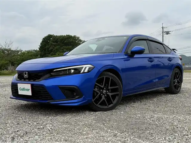 ホンダ シビック EX 兵庫県 2022(令4)年 2.6万km プレミアムクリスタルブルークリスタル 純正OPテールゲートスポイラー/純正ナビ/フルセグTV/前2席パワーシート/BOSEサウンド/ワイヤレス充電/LEDヘッドライト/LEDフォグ/スマートキー/ハーフレザーシート