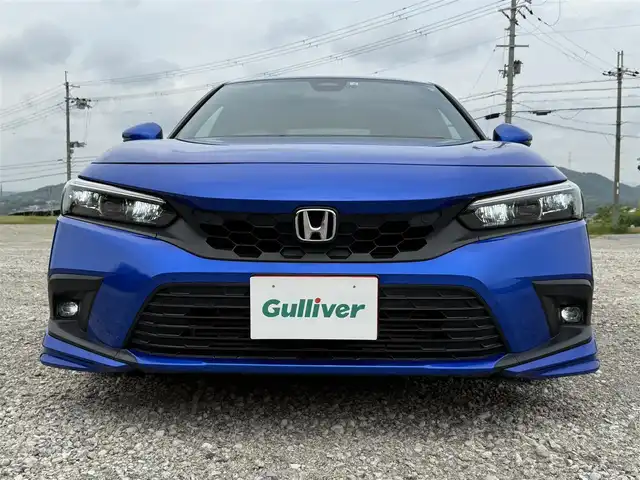 ホンダ シビック EX 兵庫県 2022(令4)年 2.6万km プレミアムクリスタルブルークリスタル 純正OPテールゲートスポイラー/純正ナビ/フルセグTV/前2席パワーシート/BOSEサウンド/ワイヤレス充電/LEDヘッドライト/LEDフォグ/スマートキー/ハーフレザーシート