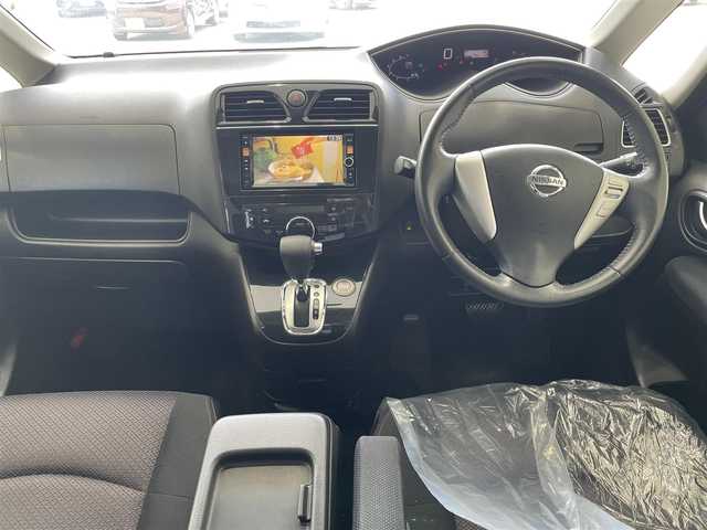 日産 セレナ ハイウェイスター Sハイブリッド 沖縄県 2013(平25)年 7.2万km ブリリアントシルバー (株)IDOMが運営する【じしゃロンOO店】の自社ローン専用車両になりますこちらは現金またはオートローンご利用時の価格です。自社ローンご希望の方は別途その旨お申付け下さい/・プッシュスタート　/・純正ナビ　/・Ｂｌｕｅｔｏｏｔｈ接続　/・バックカメラ　/・ＥＴＣ　/・両側パワースライドドア　/・クルーズコントロール　/・スマートキー　/・純正フロアマット　/・純正アルミホイール　/・取扱説明書