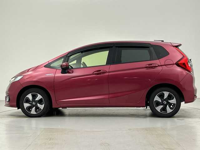 ホンダ フィット ハイブリット L ホンダセンシング 愛知県 2017(平29)年 6万km ルージュアメジストM 純正７インチナビ/・フルセグ/・CD/DVD/・Bluetooth/バックカメラ/ETC/ステアリングスイッチ/衝突軽減ブレーキ/レーンアシスト/アダプティブクルーズコントロール/横滑り防止/LEDヘッドライト/オートライト/純正ドライブレコーダー/プッシュスタート/スペアキーあり/取説・保証書あり