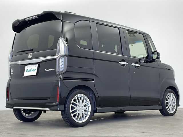 ホンダ Ｎ ＢＯＸ カスタム L ターボ 鹿児島県 2023(令5)年 0.8万km クリスタルブラックパール 純正ナビ/（CD/DVD/BT/フルセグTV）/両側パワースライドドア/ホンダセンシング/パドルシフト/レーダークルーズコントロール/電動パーキングブレーキ/オートホールド機能/ハーフレザーシート/シートヒーター/アイドリングストップ/オートライト/オートマチックハイビーム/リアサンシェード/スマートキー/プッシュスタート