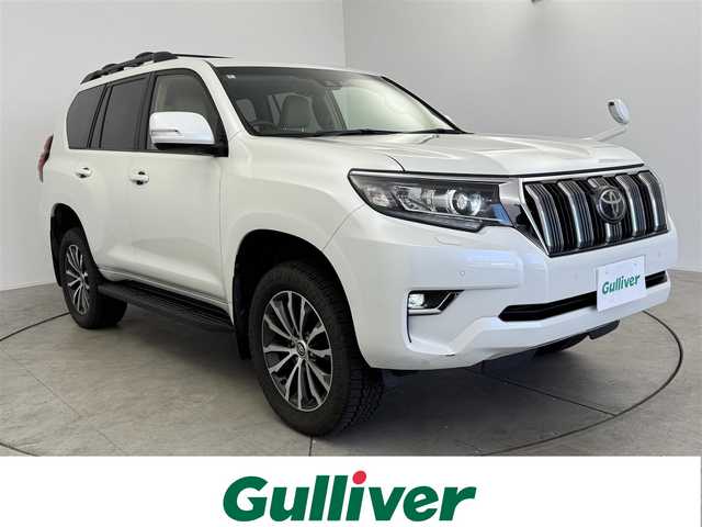 トヨタ ランドクルーザー プラド TX Lパッケージ 愛知県 2020(令2)年 3.9万km ホワイトパールクリスタルシャイン サンルーフ/ルーフレール/7人乗り/ベージュレザー/アルパインナビ　/(ＣＤ／ＤＶＤ／ＢＴ／フルセグ)/ＨＤＭＩ/USB/デジタルインナーミラー/バックカメラ/ＥＴＣ　/クルーズコントロール/トヨタセーフティセンス/クリアランスソナー/ワイパーデアイザー　/パワーシート　/シートヒーター　/エアーシート　/アルミホイール　/スマートキー