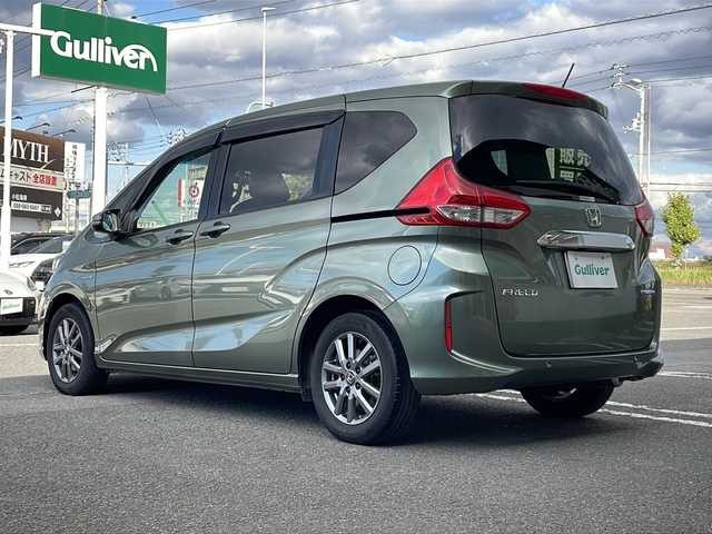 ホンダ フリード ハイブリット G ホンダセンシング 徳島県 2021(令3)年 6万km シルバーミストグリーンM ワンオーナー /無限ドアパーツ /7インチ純正SDナビ（VXM-214VFi）/フルセグTV/Bluetooth/CD/DVD再生機能/iPod/AUX/USB/衝突軽減ブレーキ /禁煙 /両側パワースライドドア /後方コーナーセンサー /クルコン追従有 /レーンキープアシスト/シートヒーター/エアシート /シートカバー付/前方純正ドライブレコーダー /純正AW15インチ/ウィンカーミラー/オートライト