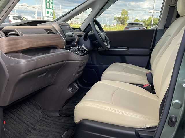 ホンダ フリード ハイブリット G ホンダセンシング 徳島県 2021(令3)年 6万km シルバーミストグリーンM ワンオーナー /無限ドアパーツ /7インチ純正SDナビ（VXM-214VFi）/フルセグTV/Bluetooth/CD/DVD再生機能/iPod/AUX/USB/衝突軽減ブレーキ /禁煙 /両側パワースライドドア /後方コーナーセンサー /クルコン追従有 /レーンキープアシスト/シートヒーター/エアシート /シートカバー付/前方純正ドライブレコーダー /純正AW15インチ/ウィンカーミラー/オートライト