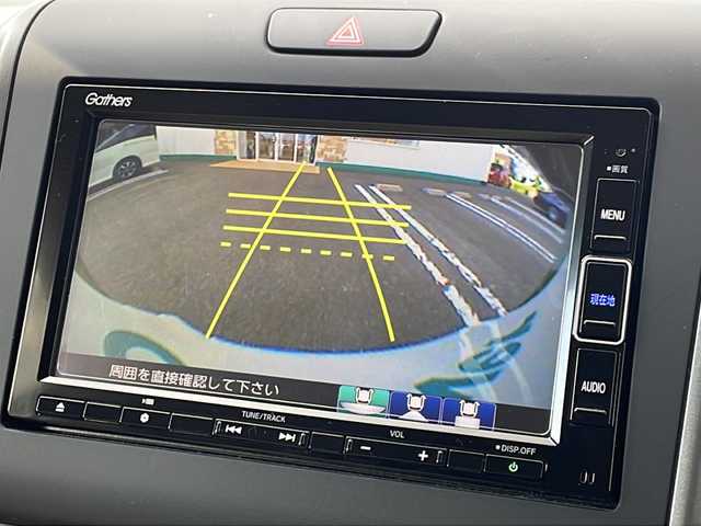 ホンダ フリード ハイブリット G ホンダセンシング 徳島県 2021(令3)年 6万km シルバーミストグリーンM ワンオーナー /無限ドアパーツ /7インチ純正SDナビ（VXM-214VFi）/フルセグTV/Bluetooth/CD/DVD再生機能/iPod/AUX/USB/衝突軽減ブレーキ /禁煙 /両側パワースライドドア /後方コーナーセンサー /クルコン追従有 /レーンキープアシスト/シートヒーター/エアシート /シートカバー付/前方純正ドライブレコーダー /純正AW15インチ/ウィンカーミラー/オートライト