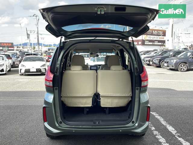 ホンダ フリード ハイブリット G ホンダセンシング 徳島県 2021(令3)年 6万km シルバーミストグリーンM ワンオーナー /無限ドアパーツ /7インチ純正SDナビ（VXM-214VFi）/フルセグTV/Bluetooth/CD/DVD再生機能/iPod/AUX/USB/衝突軽減ブレーキ /禁煙 /両側パワースライドドア /後方コーナーセンサー /クルコン追従有 /レーンキープアシスト/シートヒーター/エアシート /シートカバー付/前方純正ドライブレコーダー /純正AW15インチ/ウィンカーミラー/オートライト