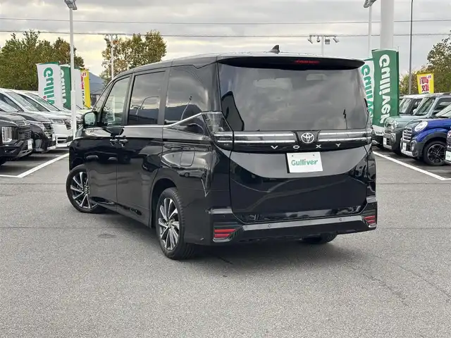 トヨタ ヴォクシー S－Z 奈良県 2023(令5)年 1.5万km アティチュードブラックマイカ 純正10.5インチディスプレイオーディオ/（TV/BT/AppleCarPlay/AndroidAut）/純正14インチフリップダウンモニター（V14T-R72R）/レーダークルーズコントロール/バックカメラ/前後コーナーセンサー/プリクラッシュセーフティ/レーンキープアシスト/両側パワースライドドア/ハーフレザーシート/前席シートヒーター/前後ドライブレコーダー/ETC2.0/LEDヘッドライト/純正17インチAW/保証書/取り扱い説明書/スペアキーX1