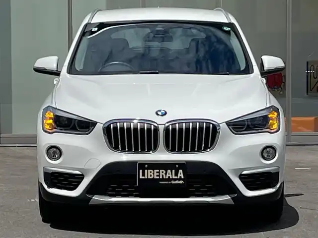 ＢＭＷ Ｘ１ xDrive 18d xライン 青森県 2017(平29)年 3.4万km アルピンホワイトⅢ /4WD/ディーゼルターボ/・純正HDDナビ/　（CD/DVD/USB/AUX/Musicコレクション）/・ドライビング・アシスト/　（レーンディパーチャーウォーニング//　前車接近警告機能/衝突軽減ブレーキ）/・バックカメラ/・パークディスタンスコントロール/・パーキングアシスト/・黒レザーシート/・D席メモリー付き/　前席パワーシート/・前席シートヒーター/・LEDヘッドライト/・ミラー一体式ETC/・リア7面プライバシーガラス/・シルバールーフレール/・ヒルクライムアシスト/・パワーバックドア/・オートワイパー/・前後フォグランプ/・レーンキーピング/・ウインカーミラー /・W/サイド/カーテンエアバッグ /・ABS/・スマートキーx2/・保証書・取説