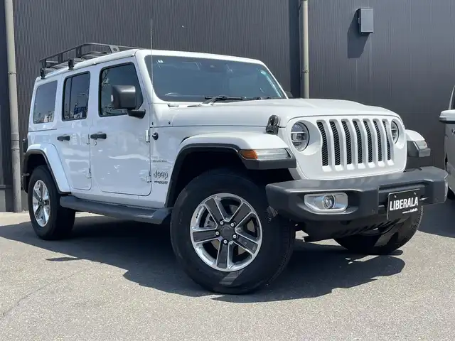 クライスラー・ジープ ジープ ラングラー アンリミテッド サハラ 香川県 2019(令1)年 5.5万km 白 スマートキー/4WD/アイドリングストップ/ACC/バックカメラ/純正ナビ/地デジ/Bluetooth/ETC/ブラックレザーシート/シートヒーター/純正18インチアルミ/コーナーセンサー/ブラインドスポットモニター/衝突軽減