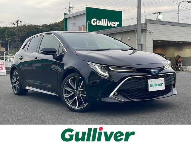 トヨタ カローラ スポーツ ハイブリッドG Z 山口県 2021(令3)年 0.9万km アティチュードブラックマイカ 純正ナビ/Bluetooth/Miracast/バックカメラ/社外前後ドライブレコーダー/前席シートヒーター/LEDヘッドライト/LEDフォグライト/オートライト/オートマチックハイビーム/衝突軽減ブレーキ/レーンキープアシスト/横滑り防止装置/ビルトインETC/スマートキー＆プッシュスタート/ステアリングスイッチ/コーナーセンサー/純正18インチAW/保証書・取説/スペアキー1個