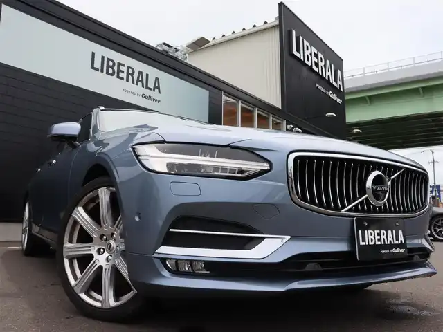 ボルボ Ｖ９０ T6 AWD インスクリプション 宮城県 2017(平29)年 7.7万km ライトブルー パノラマサンルーフ/Bowers&Wilkinsプレミアムサウンド/茶革シート（パーフォレーテッド・ファインナッパレザー）/ヘッドアップディスプレイ/アクティブクルーズコントロール/ブラインドスポットモニター/レーンキープアシスト/フットオープナー/パワーリアゲート/メモリ付パワーシート/シートベンチレーション/シートヒーター/ステアリングヒーター/純正HDDナビ(BT/USB/CD/AUX/CarPlay)/フルセグTV/360°カメラ/バックカメラ/純正20AW/アクティブベンディングランプ/LEDオートライト/オートホールド/ステアリングスイッチ/ドライブレコーダー(前後)/ETC/リモートキー/カラーコード　721　マッセルブルーメタリック