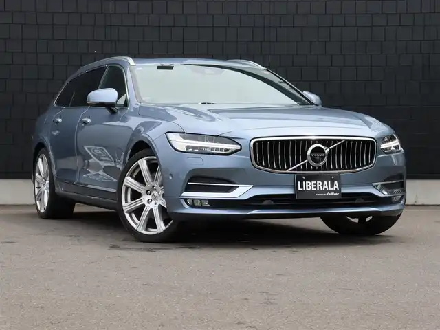 ボルボ Ｖ９０ T6 AWD インスクリプション 宮城県 2017(平29)年 7.7万km ライトブルー パノラマサンルーフ/Bowers&Wilkinsプレミアムサウンド/茶革シート（パーフォレーテッド・ファインナッパレザー）/ヘッドアップディスプレイ/アクティブクルーズコントロール/ブラインドスポットモニター/レーンキープアシスト/フットオープナー/パワーリアゲート/メモリ付パワーシート/シートベンチレーション/シートヒーター/ステアリングヒーター/純正HDDナビ(BT/USB/CD/AUX/CarPlay)/フルセグTV/360°カメラ/バックカメラ/純正20AW/アクティブベンディングランプ/LEDオートライト/オートホールド/ステアリングスイッチ/ドライブレコーダー(前後)/ETC/リモートキー/カラーコード　721　マッセルブルーメタリック