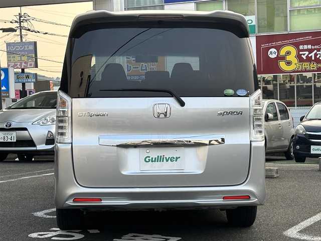 ホンダ ステップワゴン スパーダ Z 長崎県 2013(平25)年 7.4万km スーパープラチナメタリック ・社外ナビ（AM/FM/TV/IPOD）/・ブルートゥース/・USB/・両側パワースライドドア/・横滑り防止装置/・アイドリングストップ/・オートライト/・フリップダウンモニター/・パドルシフト/・３列シート