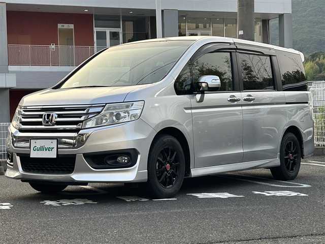 ホンダ ステップワゴン スパーダ Z 長崎県 2013(平25)年 7.4万km スーパープラチナメタリック ・社外ナビ（AM/FM/TV/IPOD）/・ブルートゥース/・USB/・両側パワースライドドア/・横滑り防止装置/・アイドリングストップ/・オートライト/・フリップダウンモニター/・パドルシフト/・３列シート