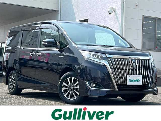 トヨタ エスクァイア ハイブリッド Gi 岐阜県 2018(平30)年 10.4万km スパークリングブラックパールクリスタルシャイン /純正9インチSDナビ(NSZT-Y68T)/(Bluetooth/AM/FM/DISC)//バックカメラ//TVキャンセラー//純正レザーシート/(前席シートヒーター)//純正フリップダウンモニター//両側パワースライドドア//プリクラッシュセーフティ//レーンキープアシスト//オートマチックハイビーム//クルーズコントロール//ドライブレコーダー//LEDヘッドライト//フォグランプ//ビルトインＥＴＣ//純正15インチAW//スマートキー//スペアキーx1