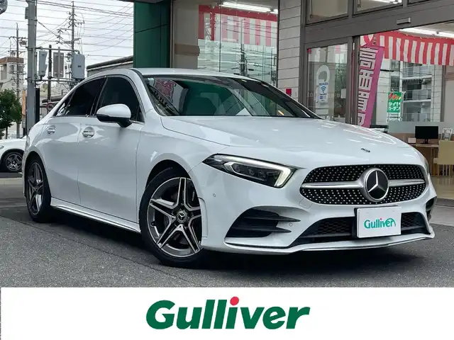 メルセデス・ベンツ Ａ２５０ 4MATIC AMGライン 愛知県 2020(令2)年 8.8万km デジタルホワイト 4WD/ナビゲーションパッケージ〈MOP〉/・コネクティッドナビ/・地デジTV/・トラフィックサインアシスト/・自動再発進機能/・アクティブステアリングアシスト/レーダーセーフティパッケージ〈MOP〉/・アクティブブレーキアシスト/・アクティブディスタンスアシストディストロニック/・PRE-SAFEプラス/・アクティブブラインドスポットアシスト/・アクティブレーンキープアシスト/10.25型ワイドディスプレイ／メルセデスミーコネクト/10.25型コクピットディスプレイ/黒合皮／スエード調コンビスポーツシート/前席パワーシート(運転席イージーエントリー)/前席シートヒーター/ディンプルナッパ革巻きフラットボトムステアリング/マルチビームLEDヘッドライト/アダプティブハイビームアシストプラス/純正18インチAMG5本スポークAW/パークトロニック/アクティブパーキングアシスト/リアクロストラフィックアラート/キーレスゴー