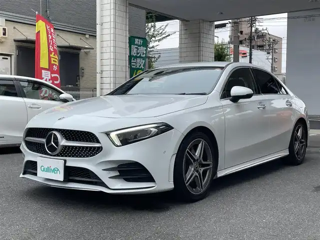 メルセデス・ベンツ Ａ２５０ 4MATIC AMGライン 愛知県 2020(令2)年 8.8万km デジタルホワイト 4WD/ナビゲーションパッケージ〈MOP〉/・コネクティッドナビ/・地デジTV/・トラフィックサインアシスト/・自動再発進機能/・アクティブステアリングアシスト/レーダーセーフティパッケージ〈MOP〉/・アクティブブレーキアシスト/・アクティブディスタンスアシストディストロニック/・PRE-SAFEプラス/・アクティブブラインドスポットアシスト/・アクティブレーンキープアシスト/10.25型ワイドディスプレイ／メルセデスミーコネクト/10.25型コクピットディスプレイ/黒合皮／スエード調コンビスポーツシート/前席パワーシート(運転席イージーエントリー)/前席シートヒーター/ディンプルナッパ革巻きフラットボトムステアリング/マルチビームLEDヘッドライト/アダプティブハイビームアシストプラス/純正18インチAMG5本スポークAW/パークトロニック/アクティブパーキングアシスト/リアクロストラフィックアラート/キーレスゴー