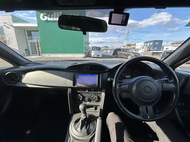 トヨタ ８６ G 宮城県 2012(平24)年 7.9万km クリスタルブラックシリカ HKS車高調整式サスペンション/社外マフラー/社外SDナビ/【CD/DVD/SD/USB/AUX】/Bluetooth/むち打ち傷害軽減フロントシート/キーレスエントリー/電動格納式ミラー/ディスチャージヘッドライト/純正フロアマット