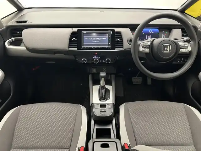 ホンダ フィット e:HEVクロスター 愛媛県 2020(令2)年 8.7万km プレミアムサンライトホワイトパール AA落札成約済み//衝突軽減ブレーキ〈CMBS〉 誤発進抑制機能 後方誤発進抑制機能 近距離衝突軽減ブレーキ 歩行者事故低減ステアリング 路外逸脱抑制機能 渋滞追従機能付アダプティブ・クルーズ・コントロール〈ACC〉 車線維持支援システム〈LKAS〉 先行車発進お知らせ機能 標識認識機能 オートハイビーム 純正SDナビ Bluetooth　フルセグ　バックカメラ　親水/ヒーテッドドアミラー　熱線入りフロントウインドウ　PTCヒーター