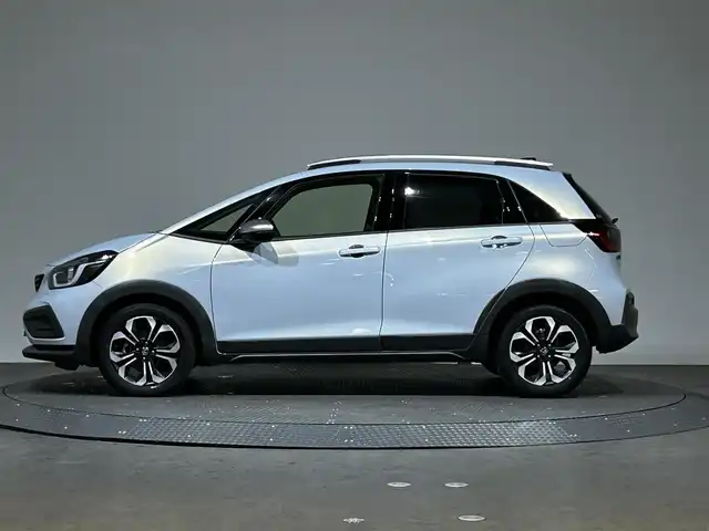 ホンダ フィット e:HEVクロスター 愛媛県 2020(令2)年 8.7万km プレミアムサンライトホワイトパール AA落札成約済み//衝突軽減ブレーキ〈CMBS〉 誤発進抑制機能 後方誤発進抑制機能 近距離衝突軽減ブレーキ 歩行者事故低減ステアリング 路外逸脱抑制機能 渋滞追従機能付アダプティブ・クルーズ・コントロール〈ACC〉 車線維持支援システム〈LKAS〉 先行車発進お知らせ機能 標識認識機能 オートハイビーム 純正SDナビ Bluetooth　フルセグ　バックカメラ　親水/ヒーテッドドアミラー　熱線入りフロントウインドウ　PTCヒーター