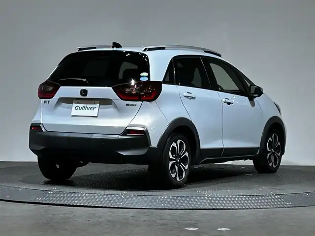 ホンダ フィット e:HEVクロスター 愛媛県 2020(令2)年 8.7万km プレミアムサンライトホワイトパール AA落札成約済み//衝突軽減ブレーキ〈CMBS〉 誤発進抑制機能 後方誤発進抑制機能 近距離衝突軽減ブレーキ 歩行者事故低減ステアリング 路外逸脱抑制機能 渋滞追従機能付アダプティブ・クルーズ・コントロール〈ACC〉 車線維持支援システム〈LKAS〉 先行車発進お知らせ機能 標識認識機能 オートハイビーム 純正SDナビ Bluetooth　フルセグ　バックカメラ　親水/ヒーテッドドアミラー　熱線入りフロントウインドウ　PTCヒーター