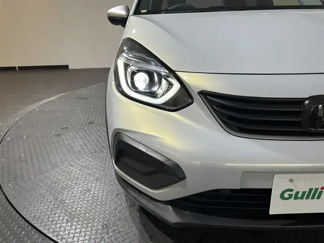 ホンダ フィット e:HEVクロスター 愛媛県 2020(令2)年 8.7万km プレミアムサンライトホワイトパール AA落札成約済み//衝突軽減ブレーキ〈CMBS〉 誤発進抑制機能 後方誤発進抑制機能 近距離衝突軽減ブレーキ 歩行者事故低減ステアリング 路外逸脱抑制機能 渋滞追従機能付アダプティブ・クルーズ・コントロール〈ACC〉 車線維持支援システム〈LKAS〉 先行車発進お知らせ機能 標識認識機能 オートハイビーム 純正SDナビ Bluetooth　フルセグ　バックカメラ　親水/ヒーテッドドアミラー　熱線入りフロントウインドウ　PTCヒーター